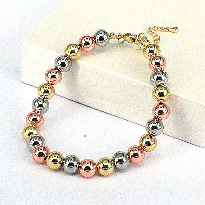 Collier de bracelets pour femmes plaqué or avec perles de cuivre rondes à la mode
