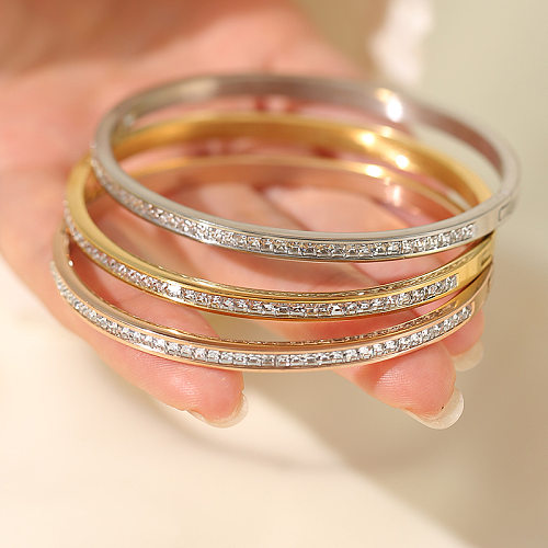 Pulseras de anillos de circonio con incrustaciones de acero de titanio con círculo de viaje de estilo simple