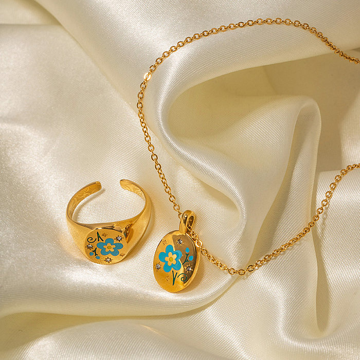 Collier avec anneaux plaqués or 18 carats, fleur élégante, incrustation d'émail en acier inoxydable, diamant artificiel