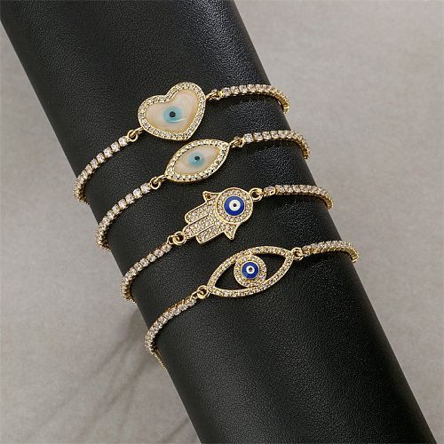 Luxuoso estilo clássico comute Devil'S Eye formato de coração pulseiras de cobre com cordão embutido de zircão