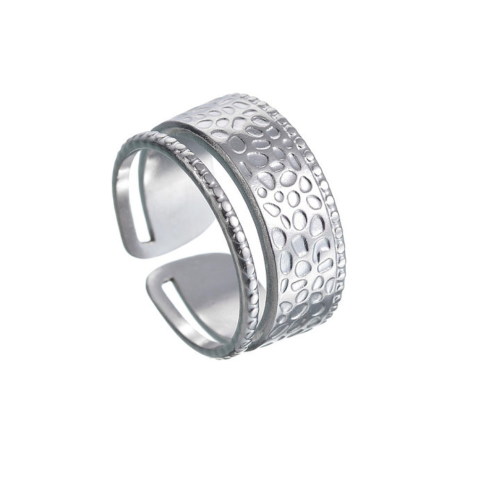 Le placage en acier titane à double anneau de style simple ajouré l'anneau ouvert
