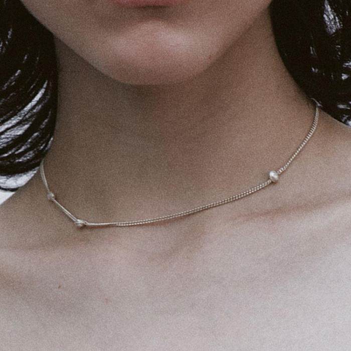 Lässige geometrische Halskette mit Kupferbeschichtung