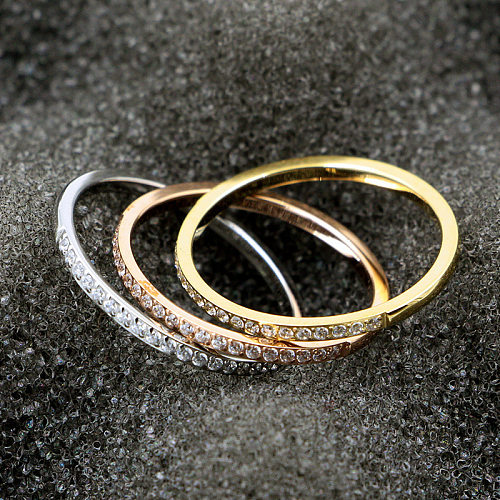 Atacado estilo simples círculo titânio aço 14K anéis de zircão banhados a ouro