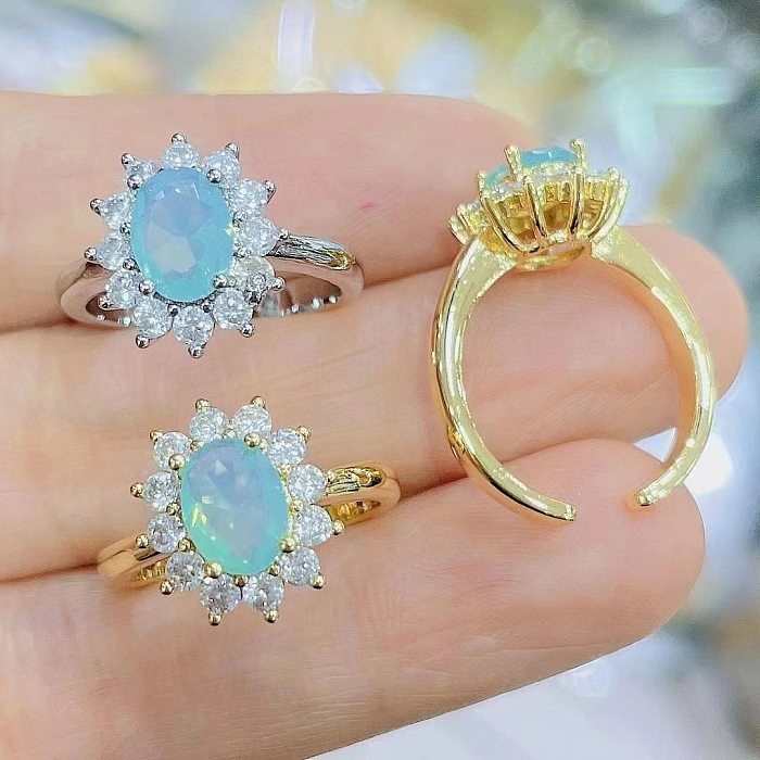 Ring in neuer Farbe, ovaler Sonnenblumen-Ring mit Opal-Intarsien und Strasssteinen