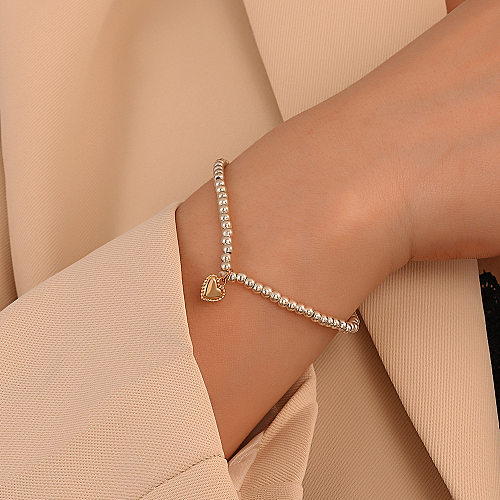 Modisches, schlichtes herzförmiges handgefertigtes Kupferarmband mit Perlen für Damen