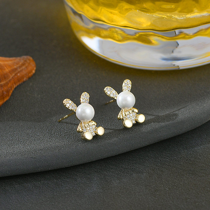 Pendientes con incrustaciones de cobre y perlas artificiales de conejo a la moda, 1 par