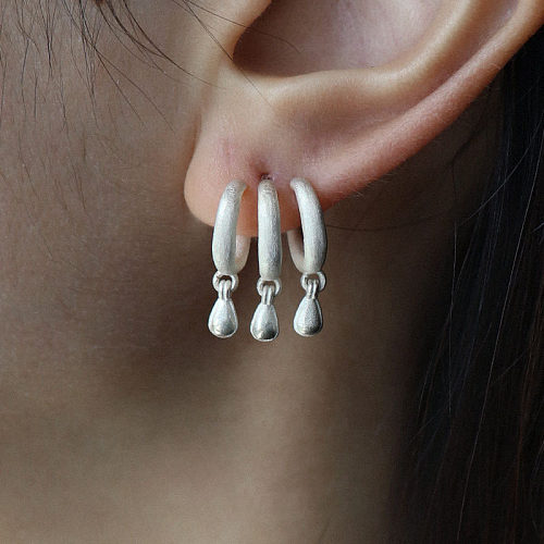 1 paire de boucles d'oreilles pendantes en cuivre plaqué en forme de U pour dame
