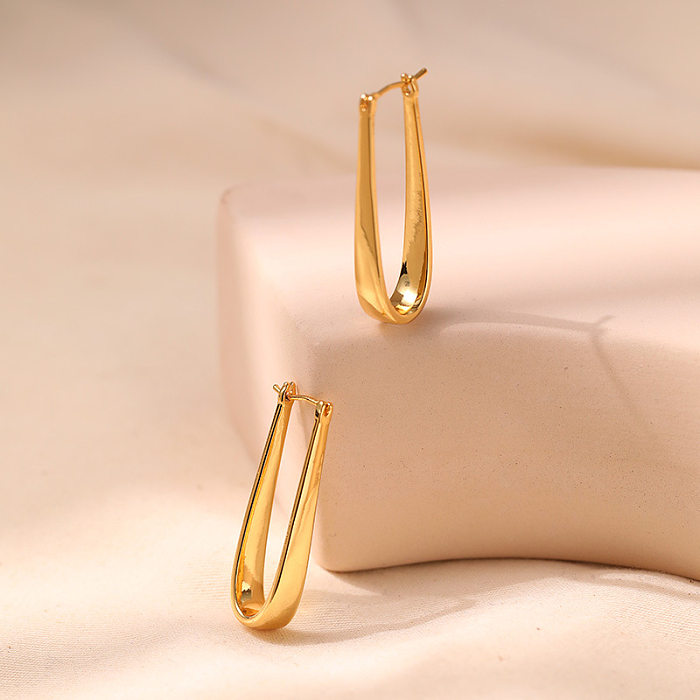 1 par feminino estilo simples comute em forma de U cor sólida chapeamento de cobre 18K brincos banhados a ouro