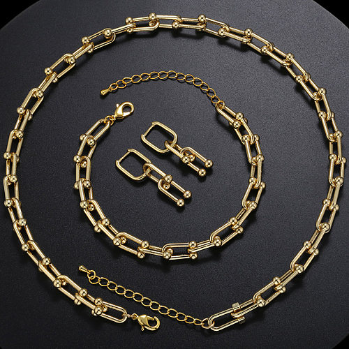 Modische einfarbige Kupferbeschichtung mit 18 Karat vergoldeten Damenarmbändern, Ohrringen und Halsketten