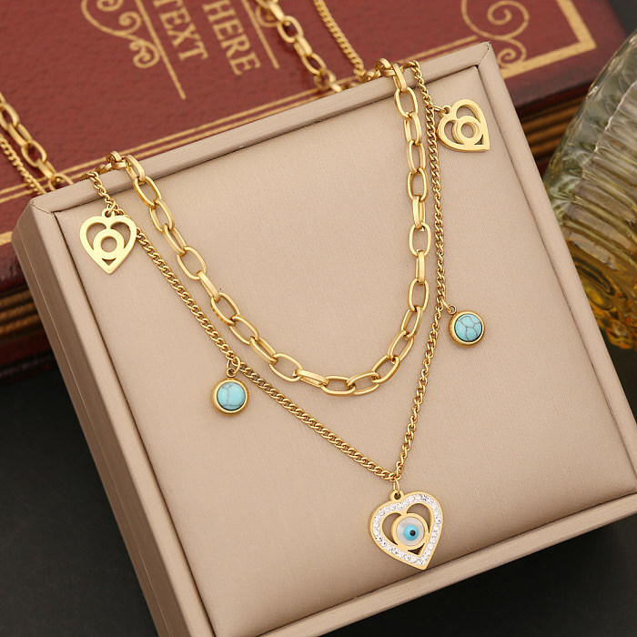 Élégant coeur forme oeil acier inoxydable placage incrustation diamant artificiel Turquoise Bracelets boucles d'oreilles collier