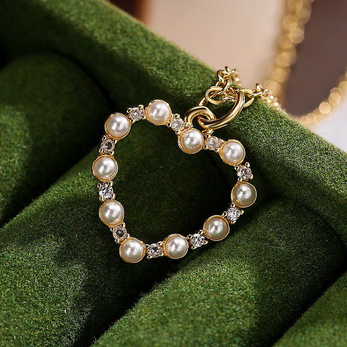1 pieza de moda en forma de corazón Chapado en cobre ahueca hacia fuera el collar con colgante de circonio de perla con incrustaciones