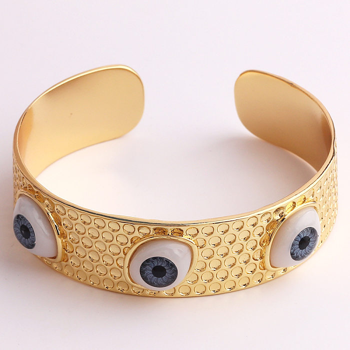 Streetwear Devil's Eye Manschettenarmbänder aus Kunststoff mit Kupferbeschichtung