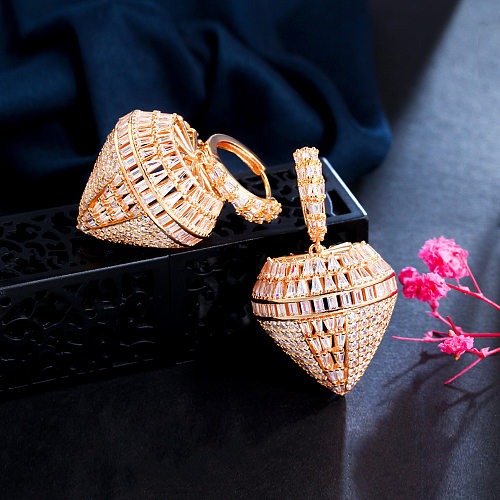 1 par de brincos geométricos glam com gotículas de água revestidas de cobre com zircônia banhada a ouro rosa e ródio