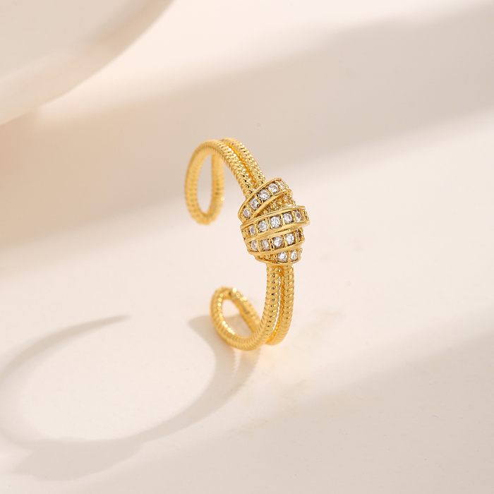 Estilo básico moderno estilo coreano nó cobre chapeamento incrustado zircão 18K anéis abertos banhados a ouro