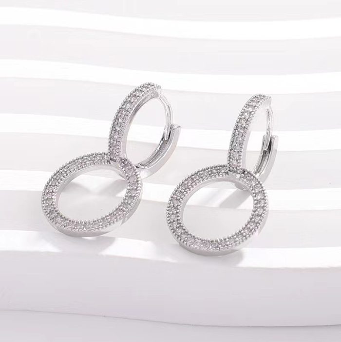 1 Paar elegante, schlichte Doppelring-Ohrringe mit Inlay aus Kupfer und künstlichem Diamant