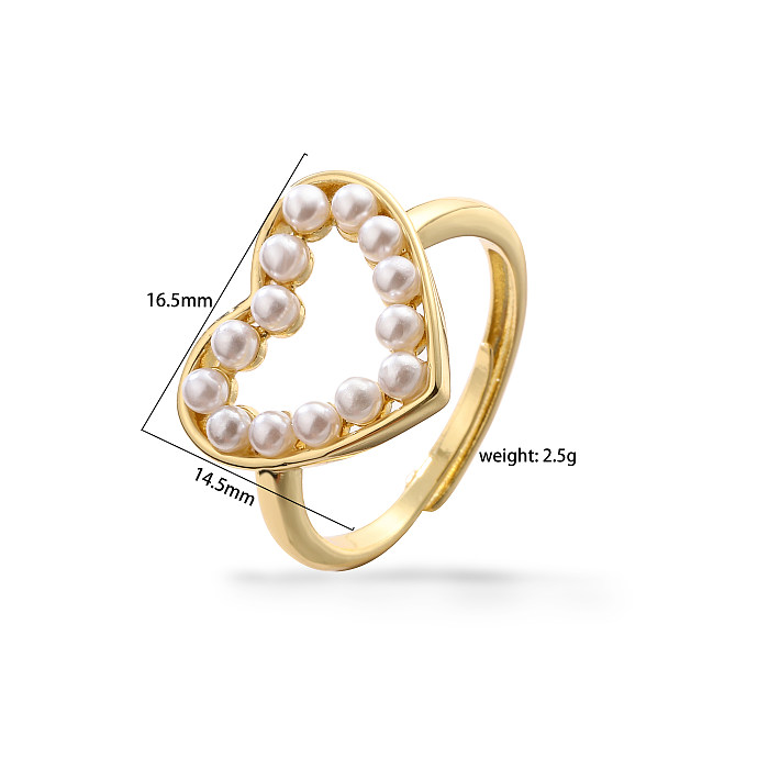 Eleganter Urlaub, schlichter Stil, Herzform, Kupfer-Emaille-Beschichtung, Intarsien, künstliche Perlen, 18 Karat vergoldete Ringe-Halskette