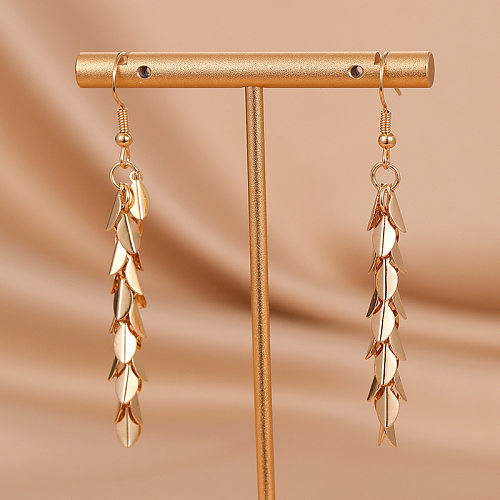 1 paire de boucles d'oreilles pendantes en plaqué cuivre avec pampilles en feuilles à la mode