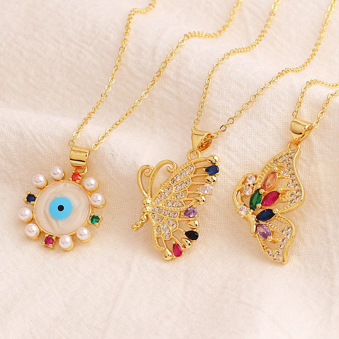 Retro Devil'S Eye Butterfly Copper Inlay Artificial Pearls Zircon Pendant Necklace