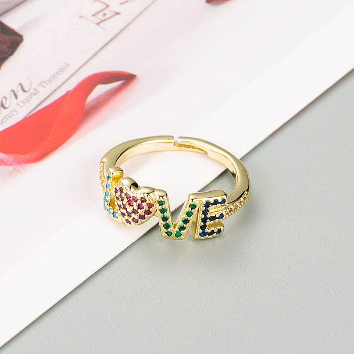 Anillo de circón de color con microincrustaciones de cobre puro con corona de amor y letras de moda