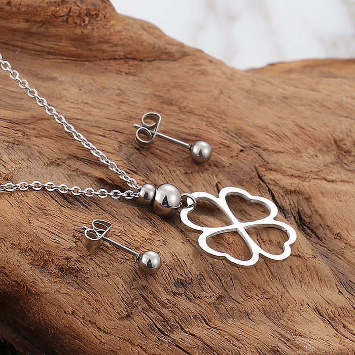 Conjunto de collar y pendientes de acero inoxidable con forma de corazón hueco Simple, joyería al por mayor