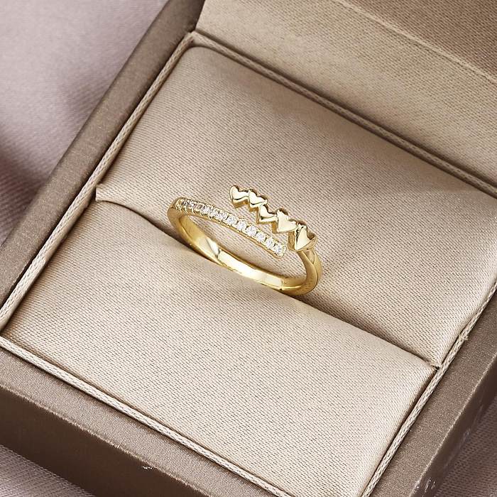 Offene Ringe im modernen Stil in Herzform mit Kupferbeschichtung und Inlay aus Zirkon