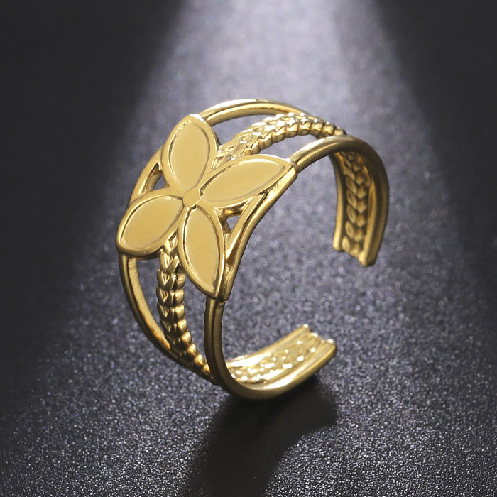 Namoradas mesmo presente elegante 18k banhado a ouro real não desbotamento corda de fio de flor de quatro pétalas aberto anel de aço inoxidável