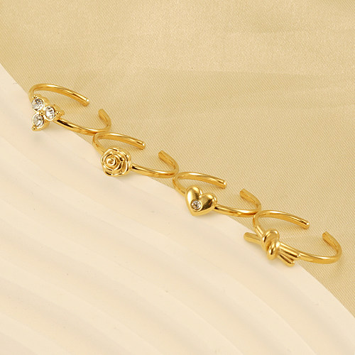Anillo abierto chapado en oro de 18 quilates con incrustaciones de acero inoxidable y flor con nudo en forma de corazón de estilo simple