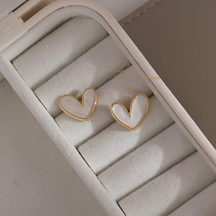 1 par de pendientes de esmalte de cobre con forma de corazón a la moda