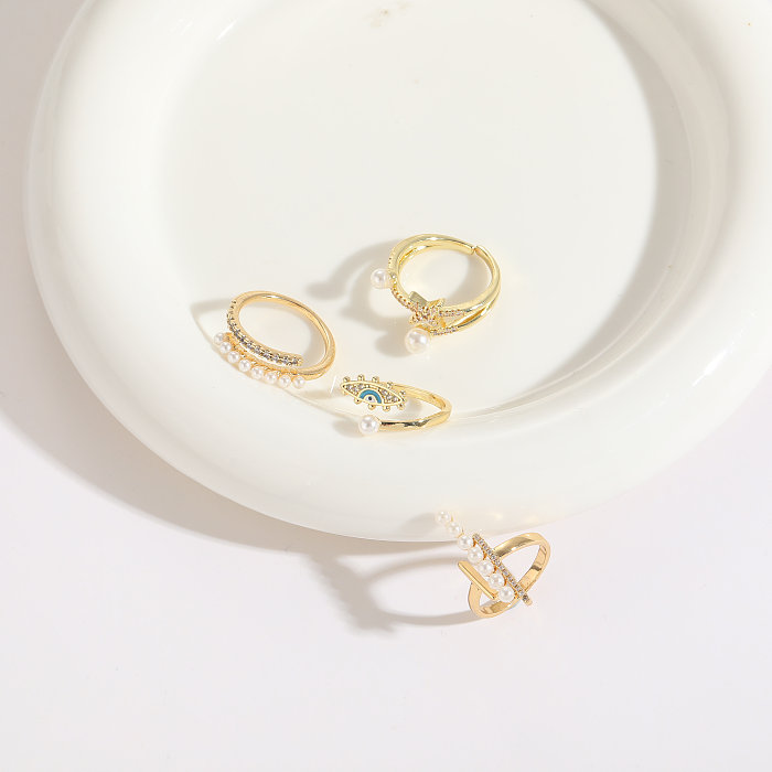 Anillo abierto de circonita con perlas artificiales con incrustaciones de cobre y ojo circular a la moda, 1 pieza