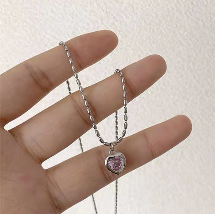 Einfache Halskette in Herzform aus Kupfer mit Überzug aus Glas und Edelstahl