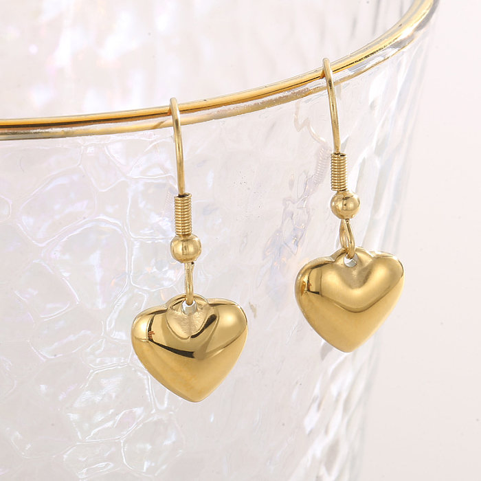 Collier de boucles d'oreilles plaqué or 18 carats en acier titane en forme de cœur de style moderne