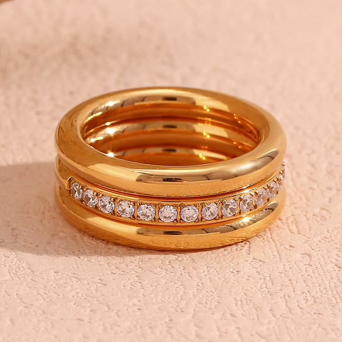 Anillos de diamantes de imitación chapados en oro de 18 quilates con incrustaciones de acero inoxidable redondos de estilo clásico de estilo simple al por mayor