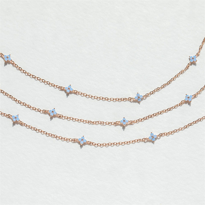 Einfache Art-Blumen-Kupfer-Beschichtung-Inlay-Zirkon-vergoldete Ringe-Ohrring-Halskette