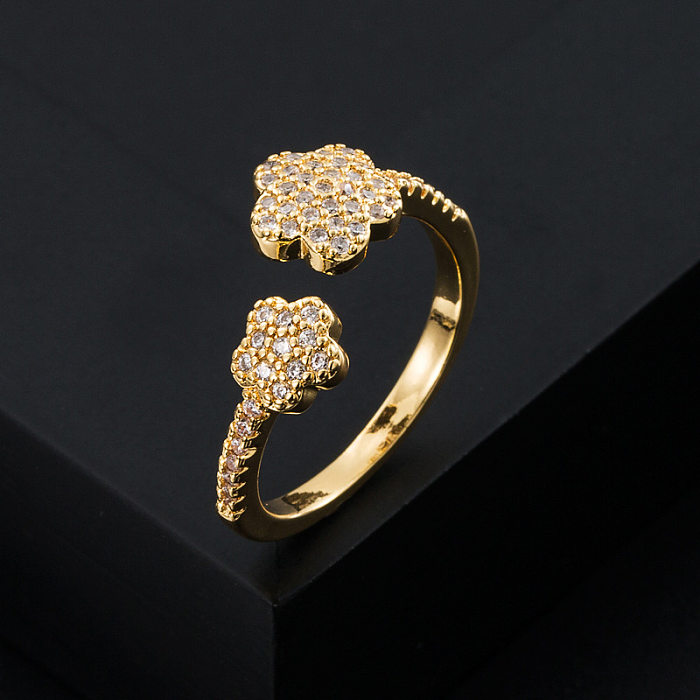 خاتم على شكل زهرة من النحاس المطلي بالذهب ومرصع بالزركون على الموضة الأوروبية والأمريكية