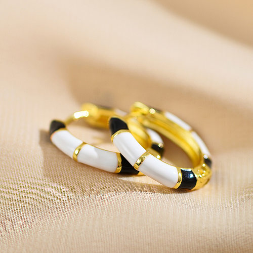 1 Paar IG Style C-förmige emaillierte Kupfer-vergoldete Ohrringe