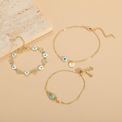 Bracelets plaqués or 14 carats avec incrustation de cuivre et d'émail en forme de cœur de style classique élégant et luxueux