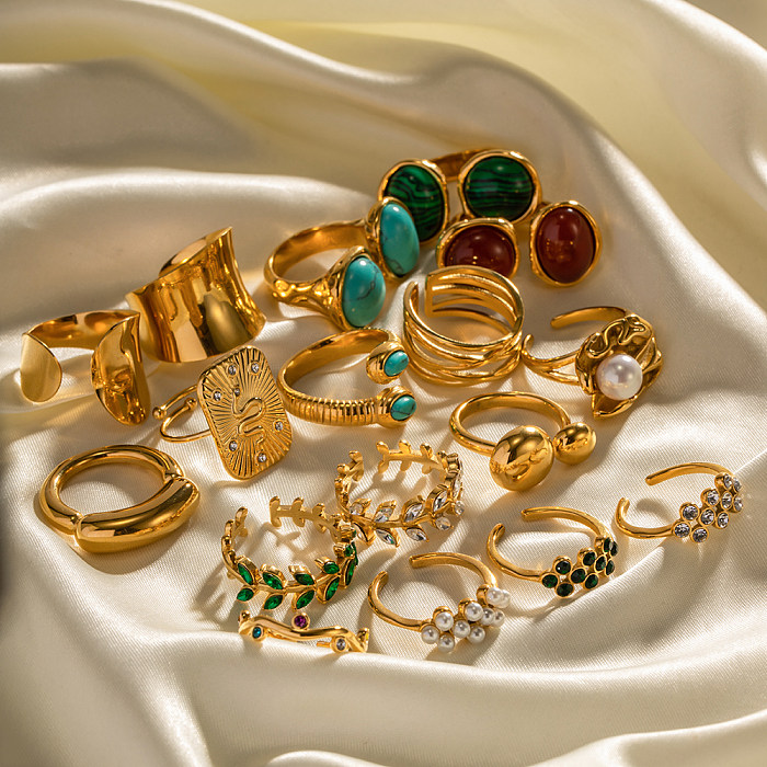 Elegante ovale Schlangenringe aus Edelstahl mit türkisfarbenem Zirkon und 18 Karat vergoldet
