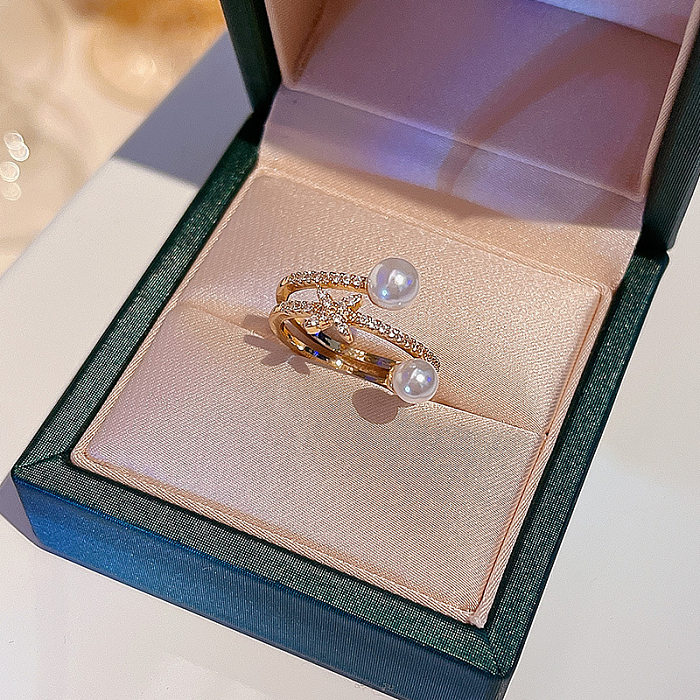 Anéis de pérola de pedras preciosas artificiais com incrustação de cobre de borboleta de flor elegante