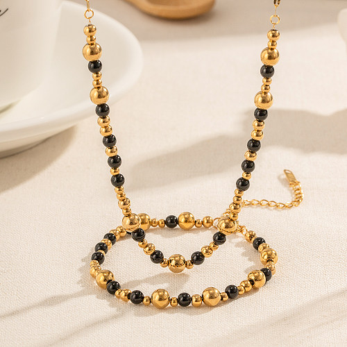 Lässige, schlichte, runde Halskette aus Edelstahl mit Perlenbeschichtung und 18-Karat-Vergoldung