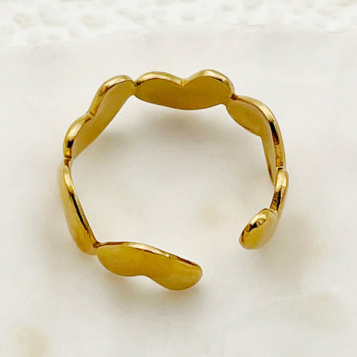Anéis banhados a ouro com revestimento de aço inoxidável em formato de coração estilo simples e glamouroso