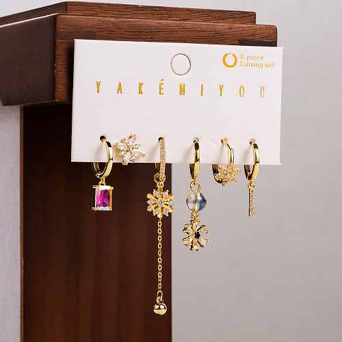 Boucles d'oreilles pendantes plaquées or 14 carats avec incrustation de cuivre papillon de style simple