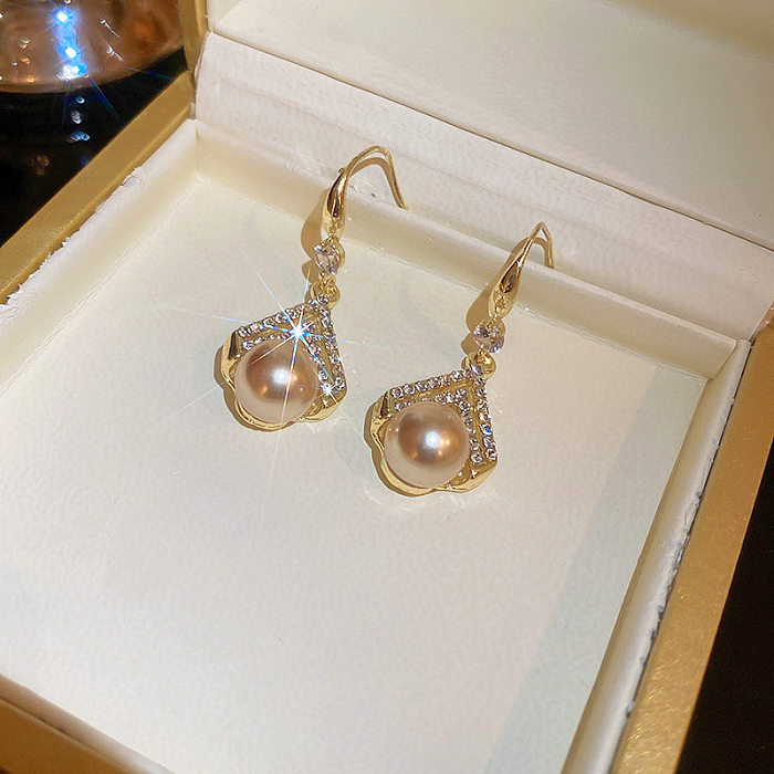 1 paire de boucles d'oreilles élégantes en cuivre avec incrustation de perles et de Zircon