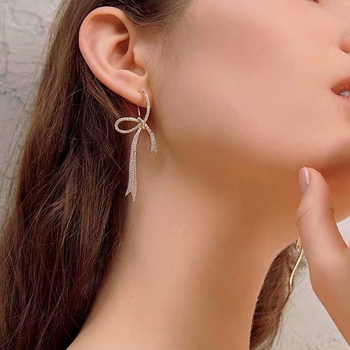 1 Paar süße Schleife-Knoten-Ohrringe mit Kupferbeschichtung und Inlay-Strasssteinen