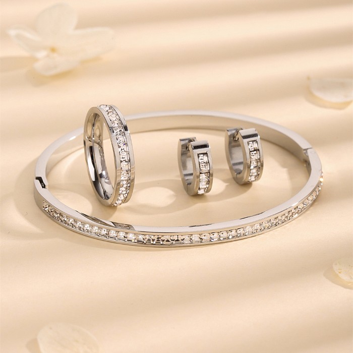 Pendientes redondos elegantes de Color sólido con incrustaciones de acero de titanio y diamantes de imitación chapados en oro de 18 quilates, anillos, pulseras