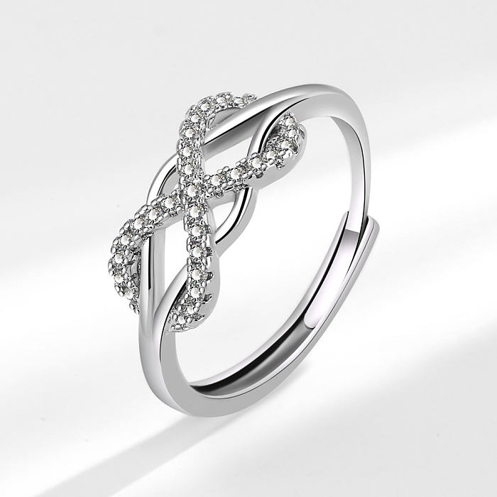 Elegante offene Ringe mit Infinity-Verkupferung und Inlay-Zirkon