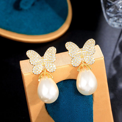 1 paire Hip-Hop Lady Sweet Butterfly Placage Inlay Cuivre Perles Artificielles Diamant Artificiel Plaqué Rhodium Argent Plaqué Boucles D'oreilles Pendantes
