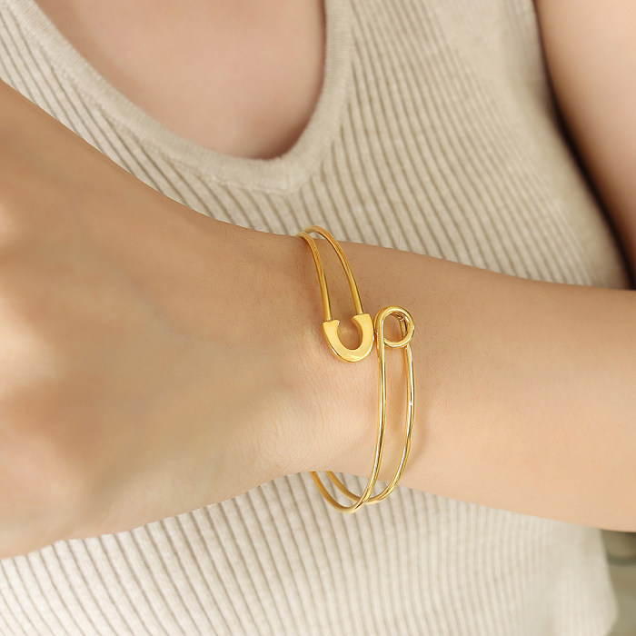 Bracelets plaqués or 18K d'anneaux d'acier titanique géométrique de style simple