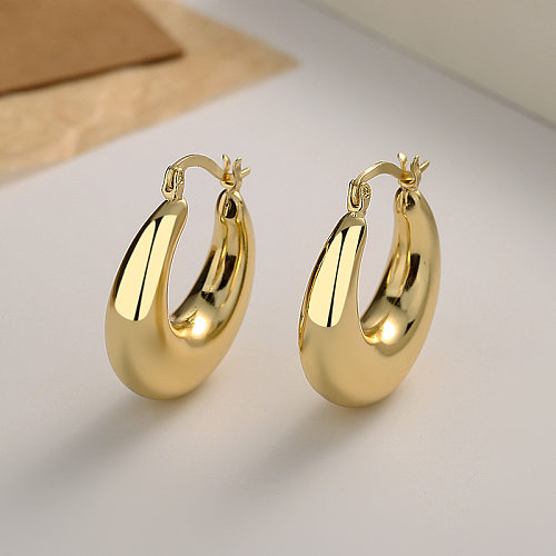 1 paire de boucles d'oreilles décontractées en forme de U en cuivre plaqué or