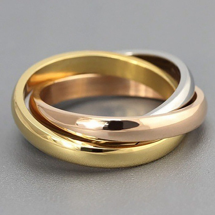 Schlichter Stil, Farbblock-Titanstahl-Beschichtung, vergoldete Ringe