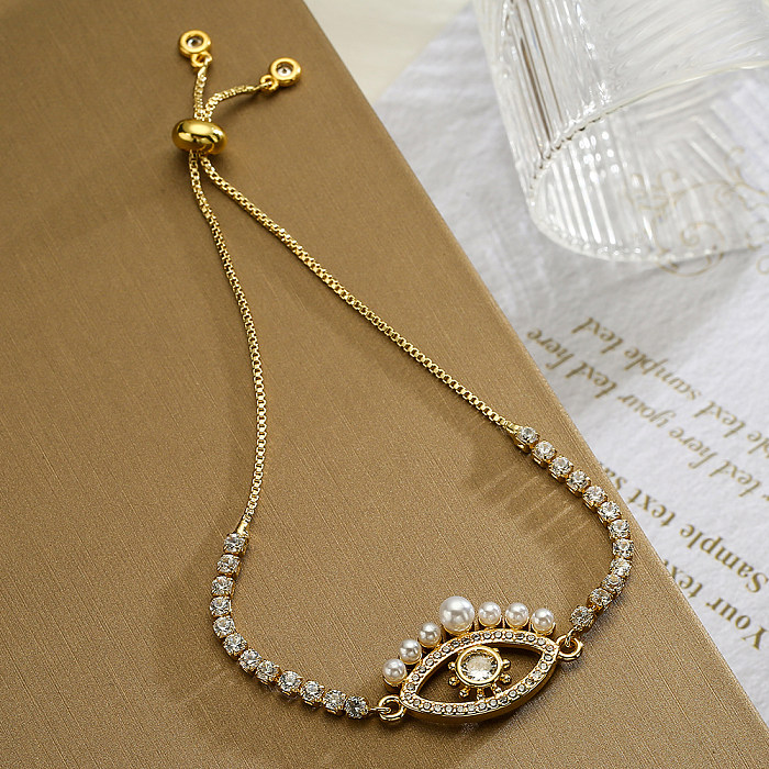 Simple Style Commute Devil'S Eye Flower Copper Plating Inlay Artificial Pearls Zircon 18K Gold Plated Bracelets